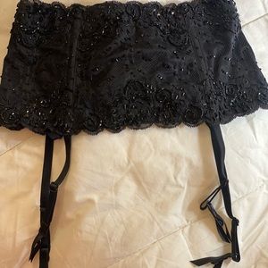 Garter belt , new with tags